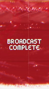 Broadcast Complete text animation with red background, glitch distortion, VHS noise, scan lines, and digital interference. Ideal for television, streaming, media, and technology concepts.