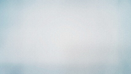 Fototapeta premium A pale blue-gray surface with delicate speckling and foglike highlights creates a quiet, spacious mood for presentation slides, social media, or flyers.