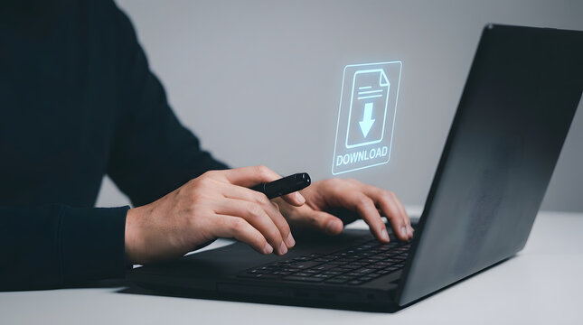 Businessperson in dark clothing using a sleek black laptop with a glowing download icon projected above the keyboard in a modern office environment featuring computer, hands, typing and projection