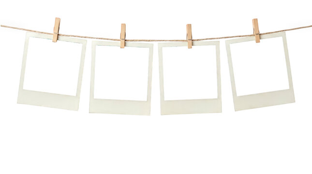 Vintage instant photo frames hanging on clothesline, blank polaroid style film set with wooden pegs, nostalgic memory gallery isolated on Transparent Background