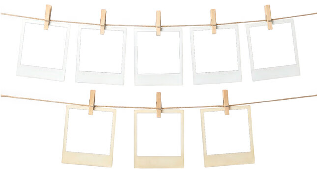 Vintage instant photo frames hanging on clothesline, blank polaroid film collection with wooden pegs, nostalgic photography display isolated on Transparent Background