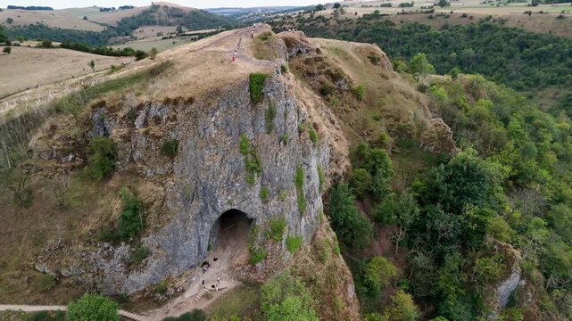 Thor's Cave is a natural cavern set in a steep limestone crag in the Peak District, United Kingdom. 4k drone footage. 