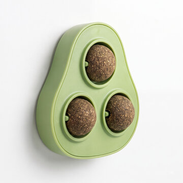 Generic avocado wall mounted triple catnip spinning ball toy isolated on white.
