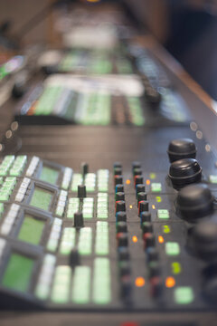 Vertical view of professional TV studio video switcher panel with copy space