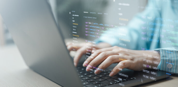Programmer writes and tests software code on a laptop, showcasing modern application development, debugging, and web technology.