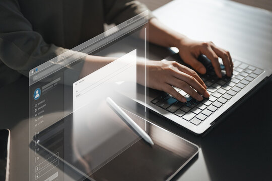 Business user composing email on a laptop with a digital interface, symbolizing email marketing, secure communication and online workflow.