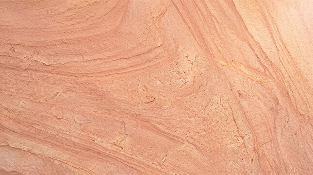 Coral pink sandstone texture background. Natural stone surface with organic wavy patterns.