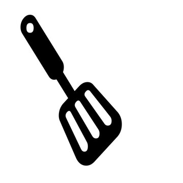 Black plastic slotted turner spatula isolated on white background for cooking and baking tools