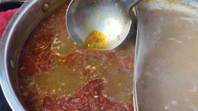 cooking soup base of  mala spicy broth from chinese style