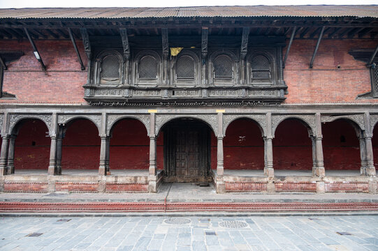 The Newari style architecture in Pashupatinath temple, Kathmandu, Nepal. It is famous for detailed wood carvings, exposed red brickwork.