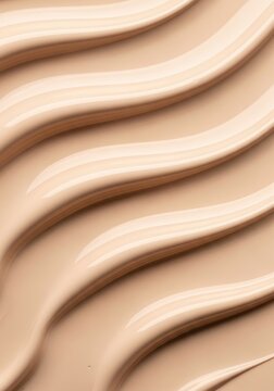 Smooth Liquid Foundation Texture Background with Creamy Beige Waves for Cosmetic and Beauty Products