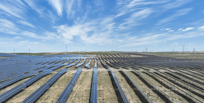 Aerial View of Vast Solar Photovoltaic Power Station in Desert Region