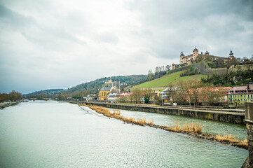 Fototapeta premium Wurzburg fortress and vineyards above riverside town