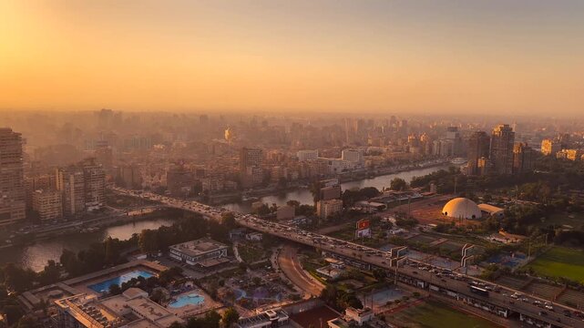 Aerial View of Cairo Nile River and Bridges at Vivid Orange Sunset