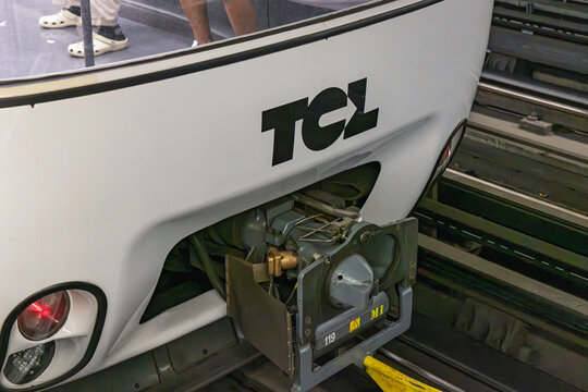Lyon, France - July 27, 2026: Close-up of TCL public transit logo and mechanical coupler on front of modern subway carriage.