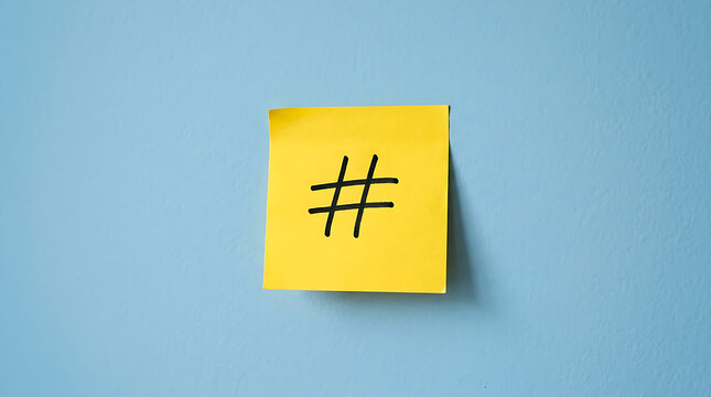 Golden hashtag symbol on a bright yellow background.