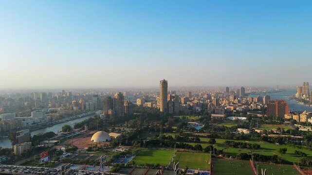 Aerial Panoramic View of Cairo Skyline with Nile River and Gezira Island at Sunset