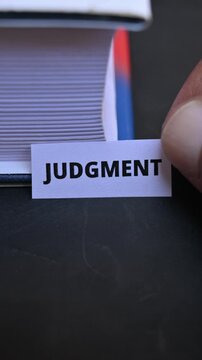 Judgment and Decision Making Concept Displayed on Minimal Paper Card
