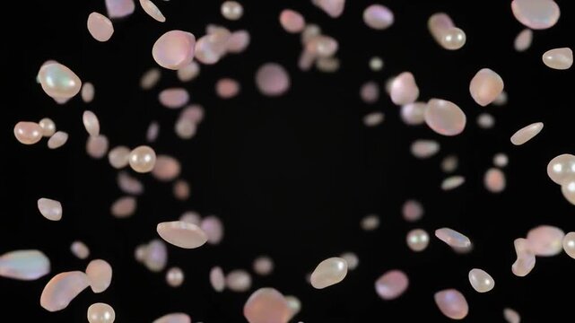 Translucent mother-of-pearl fragments rotate weightlessly through dark space, revealing subtle pink, ivory, aqua and champagne iridescence with photorealistic pearlescent texture.