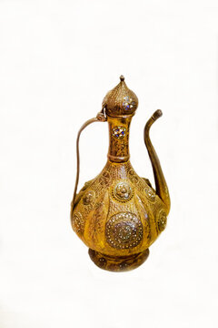 An old copper jug with beautiful painting. Items of old technology. World tourism.