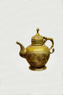 An old copper jug with beautiful painting. Items of old technology. World tourism.