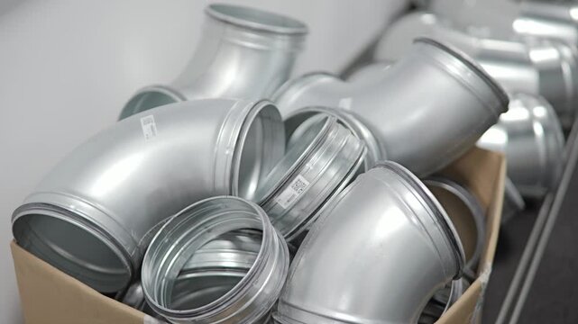 Galvanized HVAC Duct Fittings and Ventilation Components Ready for Installation