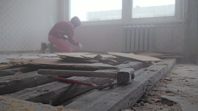Clearing Construction Debris Inside Soviet Era Apartment During Floor Demolition