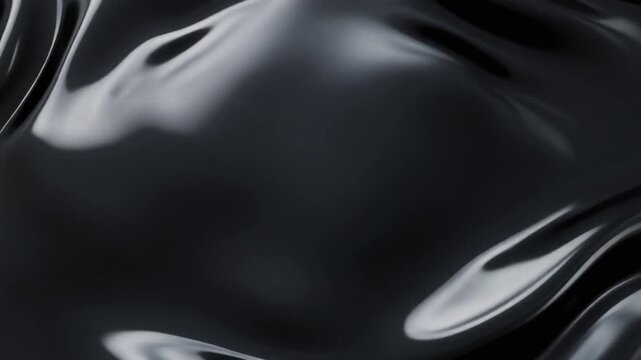 Glossy black magnetic fluid forming smooth rolling waves