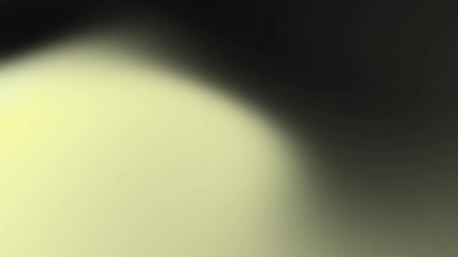 Soft ethereal glow of pale yellow light diffusing into dark abstract background with a feeling of mystery and peace