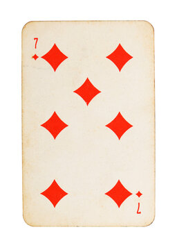 Old vintage Seven of Diamonds playing card isolated on white.