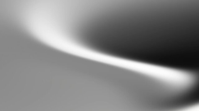Abstract monochrome gradient background with soft light and smooth flowing curves creating a sense of calm and sophistication