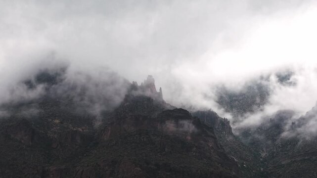 A rare moody fog captured via hyperlapse in the Superstitious Mountains. Lots of fog movement and jagged mountains.