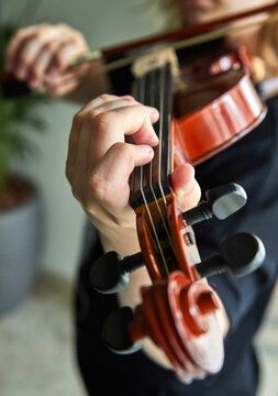 Violin classic musical instrument. Classical player hands. Details of violin playing.