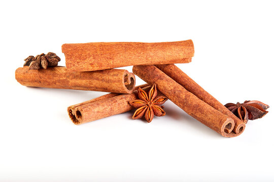 Cinnamon sticks and star anise isolated on white background
