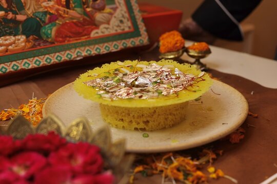 Ghewar a rajasthani sweet garnished with dry fruits and rabdi
