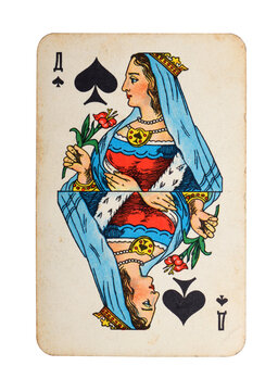 Old vintage Queen of Spades playing card isolated on white