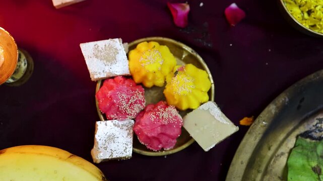 Colorful Indian Traditional Sweets Arranged for Festival Offering and Religious Ritual