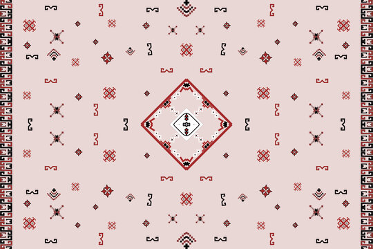 Soft pink tribal carpet pattern with central geometric diamond medallion, red ethnic symbols and southwestern border design.
