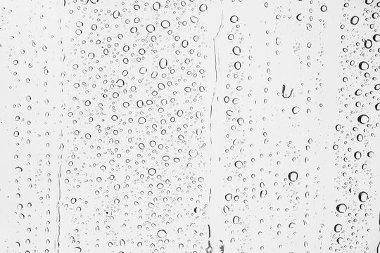 Water droplets texture overlay on dark background