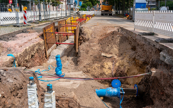 Water Pipeline Installation at Urban Construction Site &ndash; Municipal Water Network Renovation and Infrastructure Upgrade
