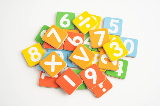 Number wood block cubes for learning Mathematic, education math concept.