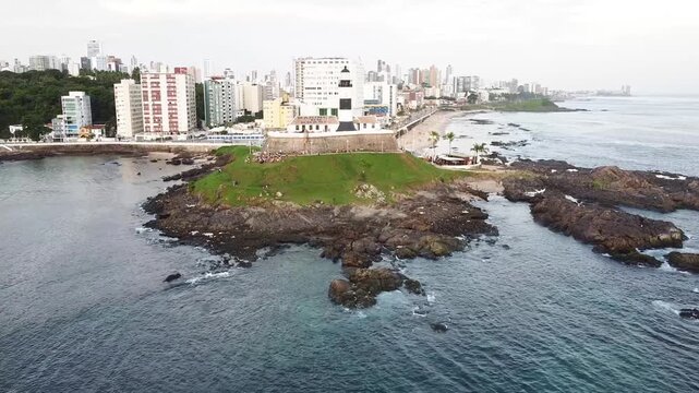 Drone footage Aerial view Barra Lighthouse (Farol da Barra), Salvador, Bahia state | Brasil