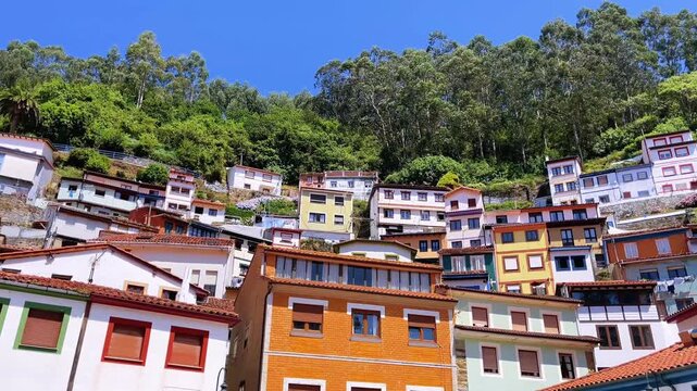 colorful houses on hillside in fishing village cudillero asturias spain
