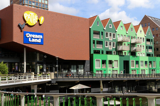 Path&eacute; and DreamLand signs in modern Zaandam cityscape. Netherlands
