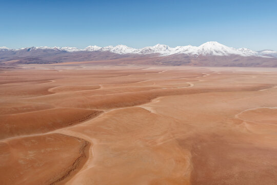 Aerial view of a vast altiplano desert plain and distant mountains, Sud L&iacute;pez, Potos&iacute;, Bolivia