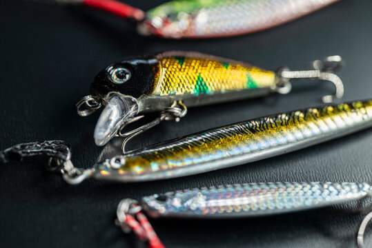 Set of artificial fishing baits with sharp hooks The Concept of predatory fish tackle