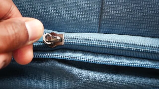 How to fix a stuck zipper on a bag or jacket