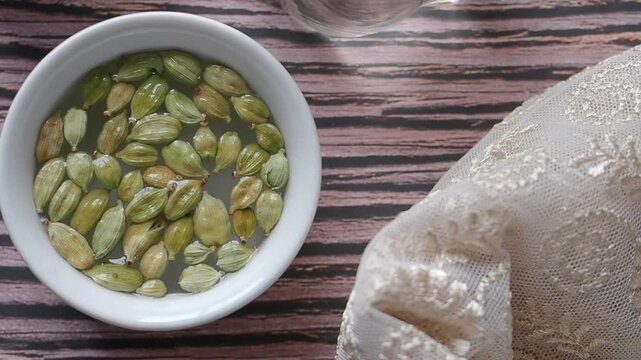 Culinary preparation with cardamom in the kitchen