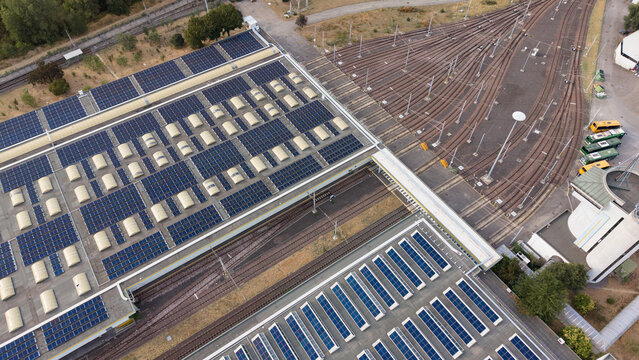 Solar panels installed across the roof of a metro depot in San Donato Milanese, Italy, illustrating renewable energy infrastructure and sustainable transport.