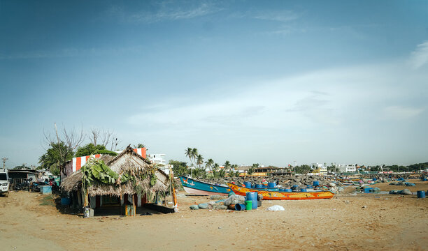 Fishing boats and huts along the shore at Chennai, Kovalam beach - August, 2026, Chennai, India
